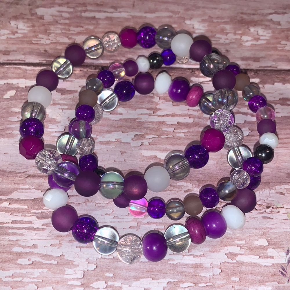 Purple stack bracelets